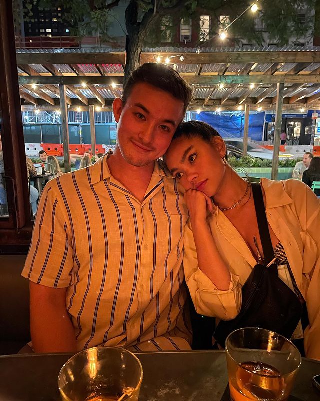 Myra Molloy in a white shirt with her boyfriend in a white shirt with blue stripes.